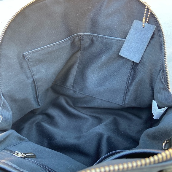 Danier black leather handbag with shiny gold colored accents - Picture 8 of 14